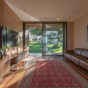 Casa Conquista / David Guerra Arquitetura e Interiores - Foto Interior, Salón
