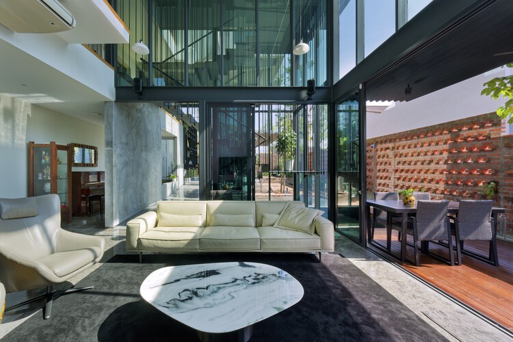 Kemaris Etxea / DRTAN LM Architect - Foto exterior, mesa, silla