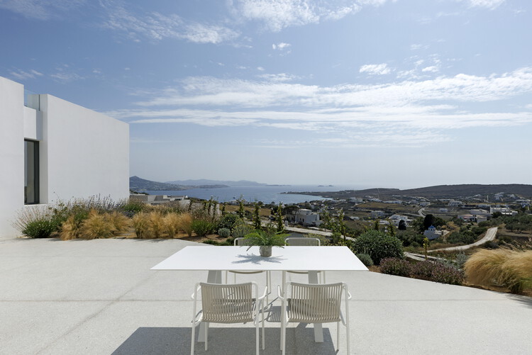 Casa RizA ii / React Architects - Foto exterior, mesa, silla